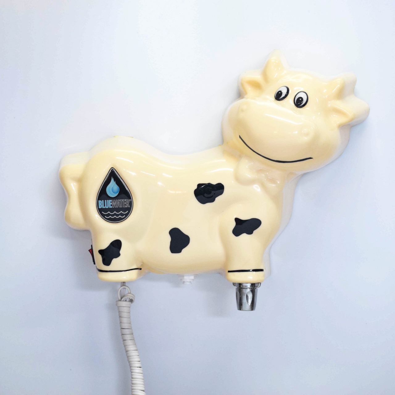 Purificador de agua infantil en forma de vaca para colegios